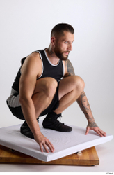 Whole Body Man White Sports Shorts Slim Athletic Kneeling Top Studio photo references